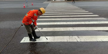 攸縣政府門戶網站 縣城管局環衛處清洗城區路段交通標志標線