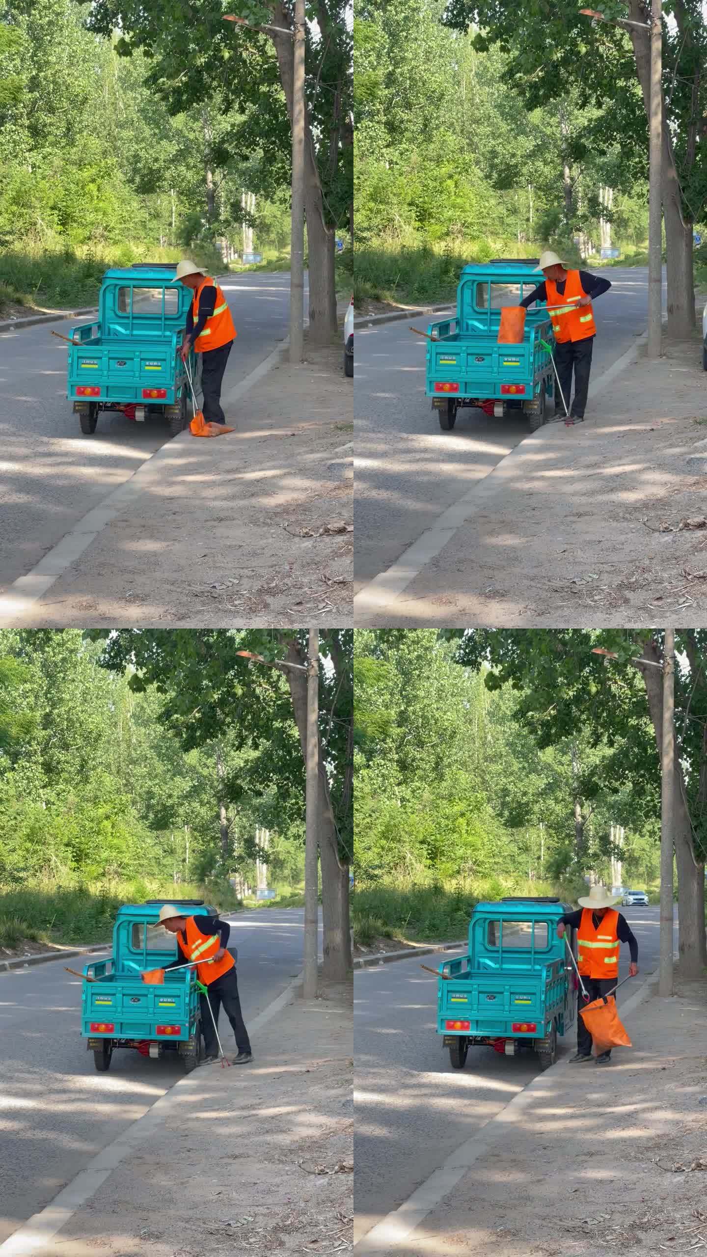 豎屏夏天路邊環衛工人打掃衛生